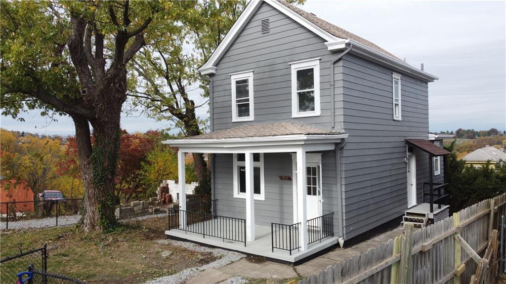 front view of house with a yard