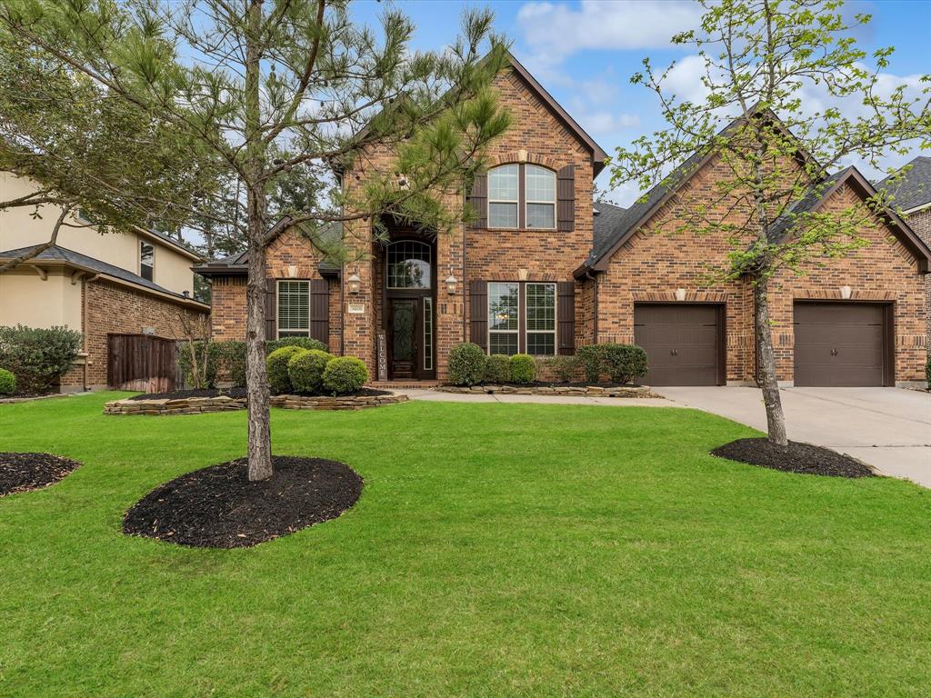 31406 Mill Creek Way located in the stunning gated community Woodtrace. No back neighbors.