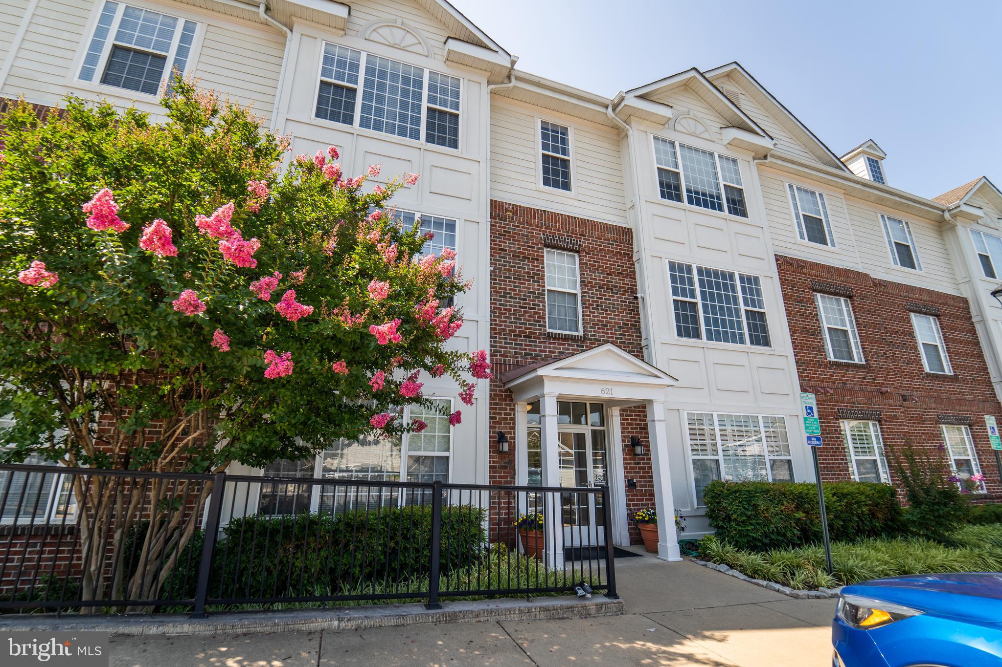 a front view of a multi story residential apartment building