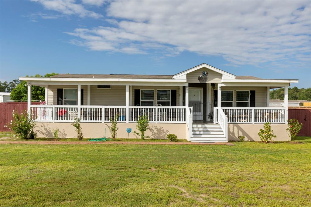 a front view of a house having yard