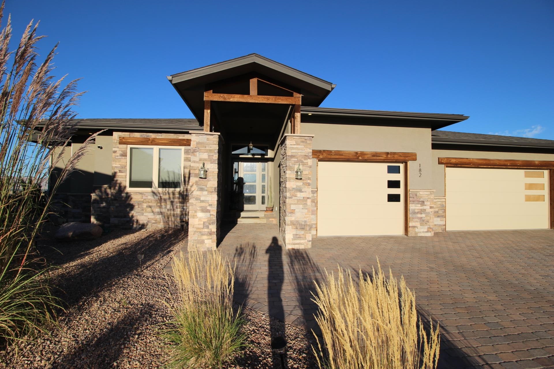 a front view of a house with parking