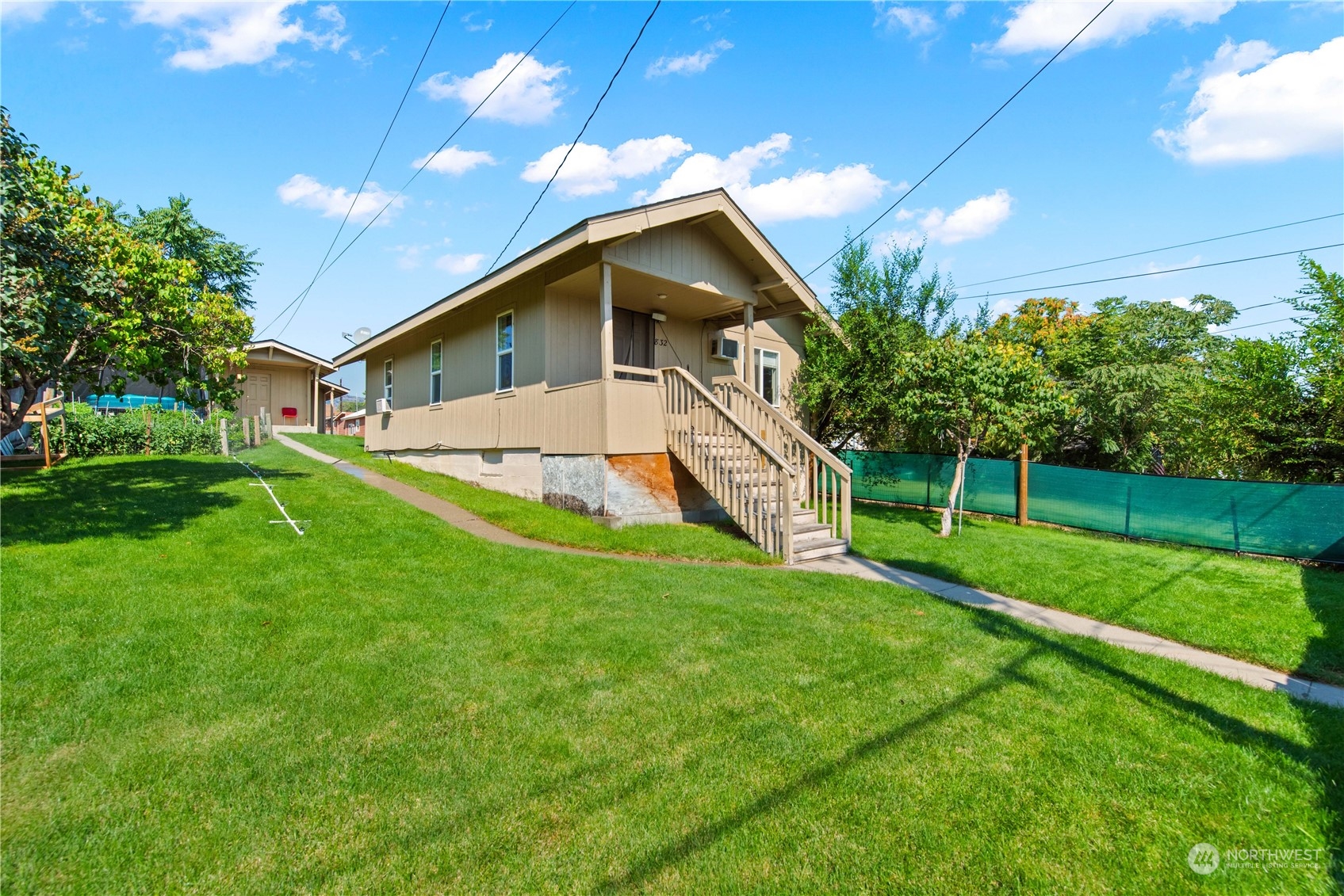 a house view with a outdoor space