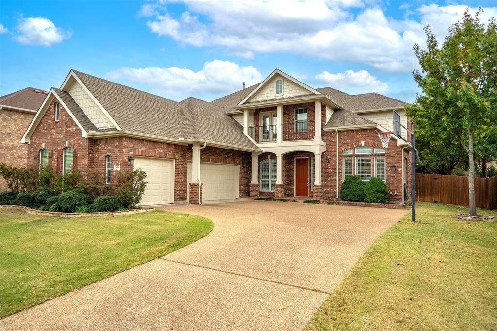 a front view of a house with yard