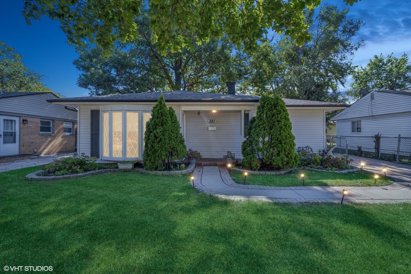 front view of a house with a yard