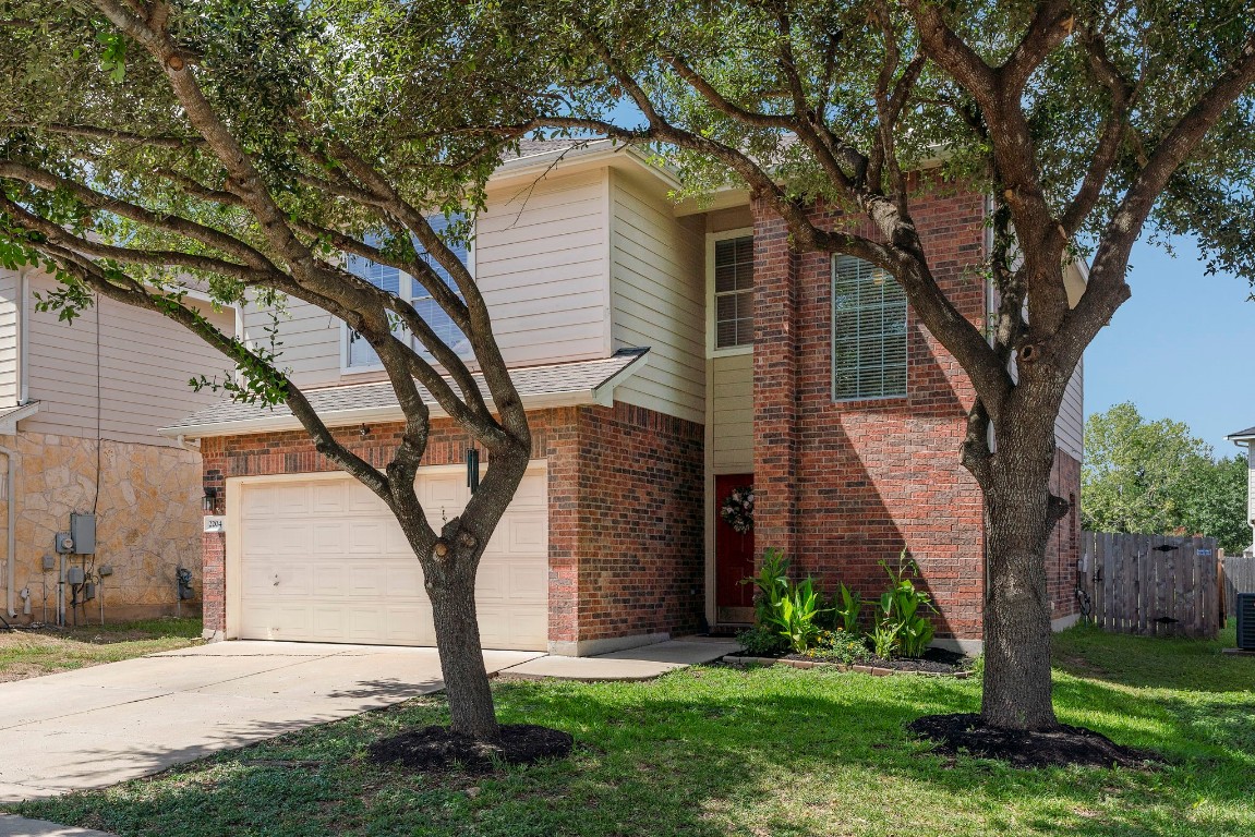 Great street appeal with mature trees in front yard.