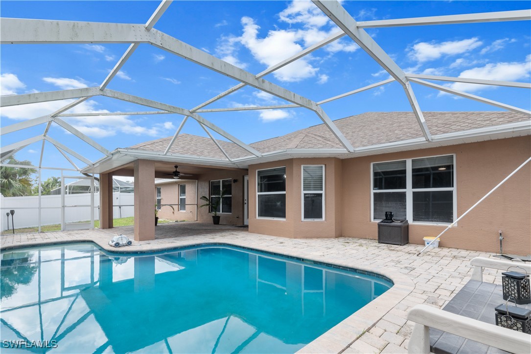 a view of pool with outdoor seating