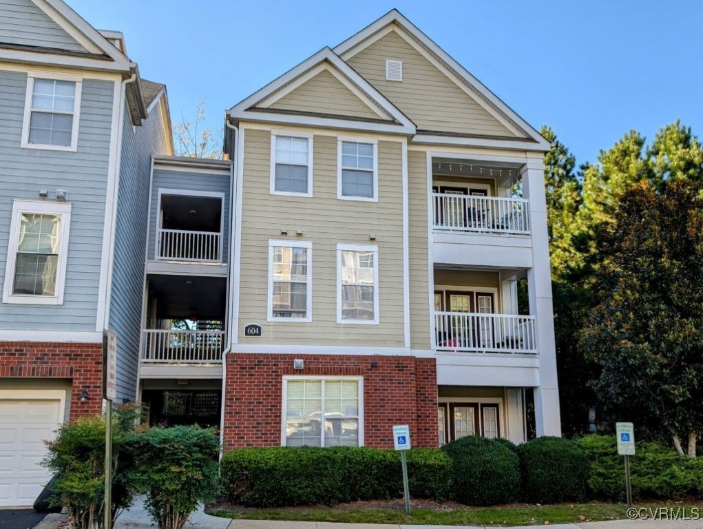 Multi unit property with a garage and a balcony