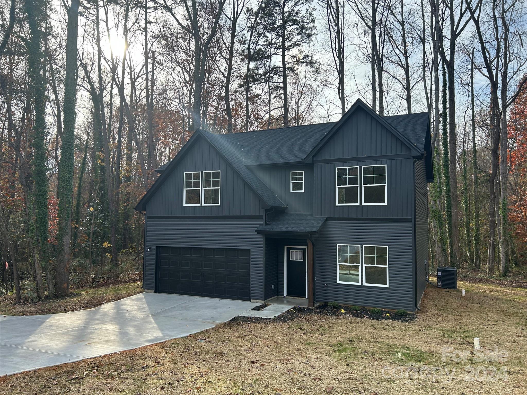 a front view of a house with yard