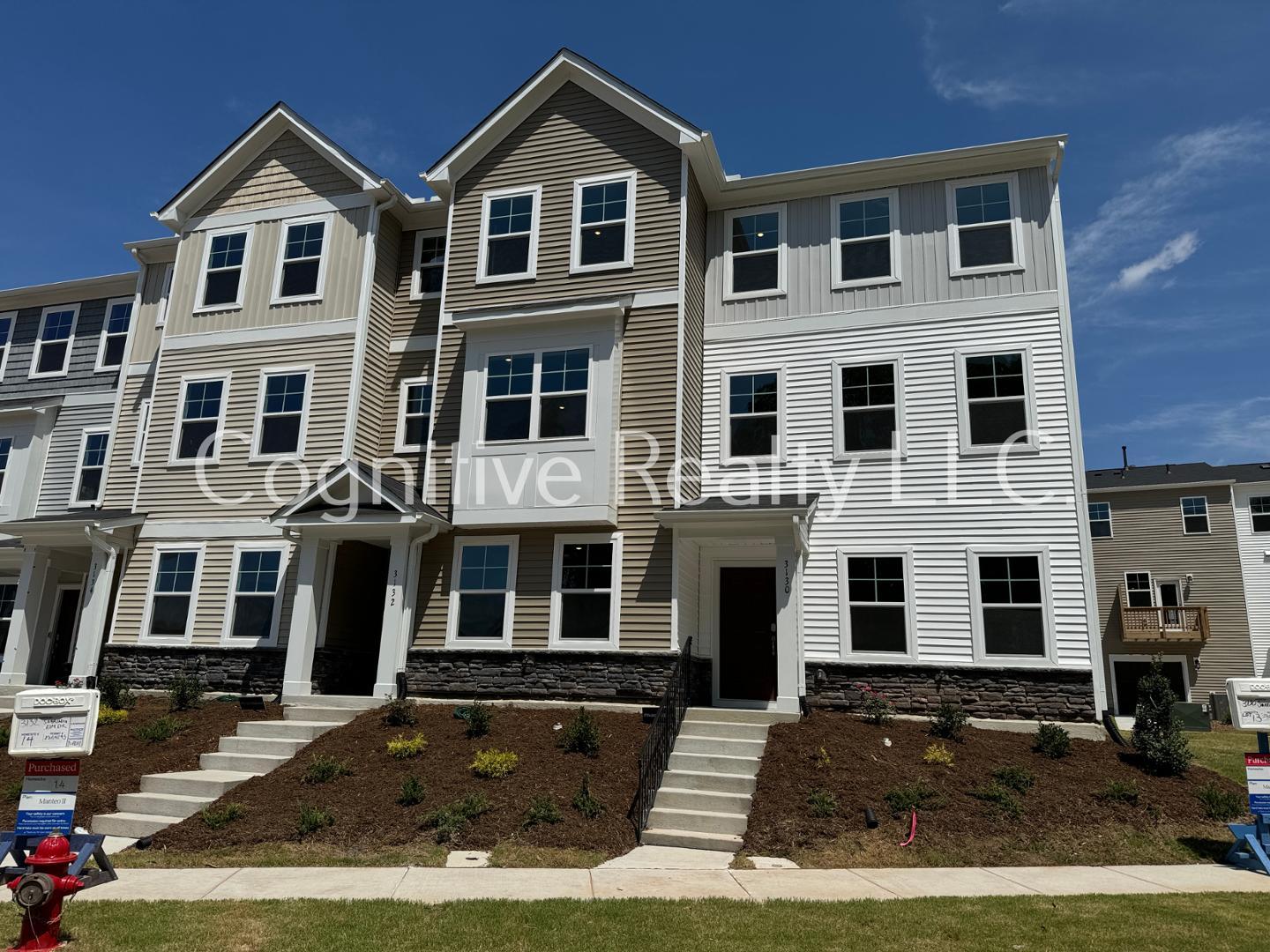 a front view of a house with yard