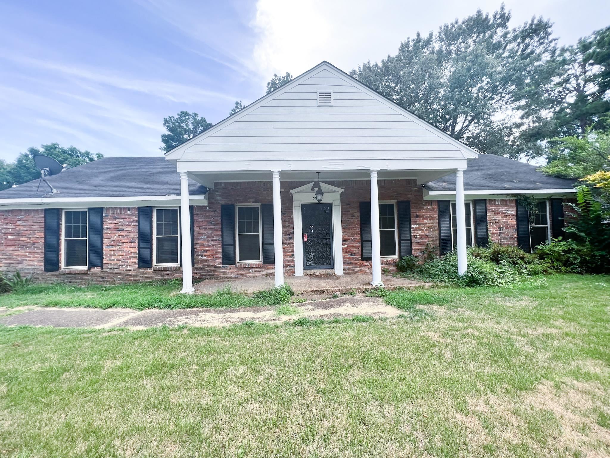 View of front of home with a front lawn