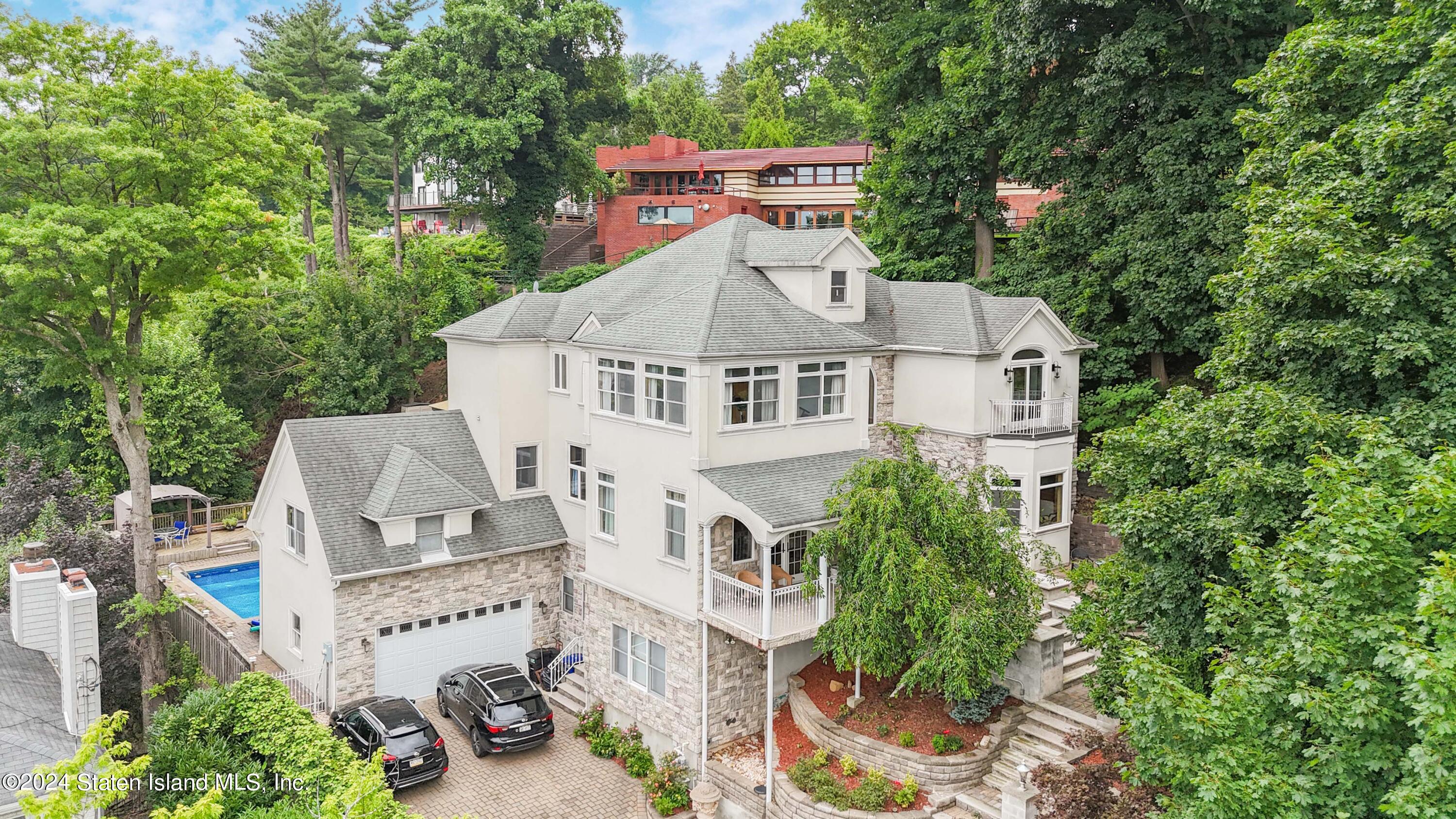 an aerial view of a house with a garden