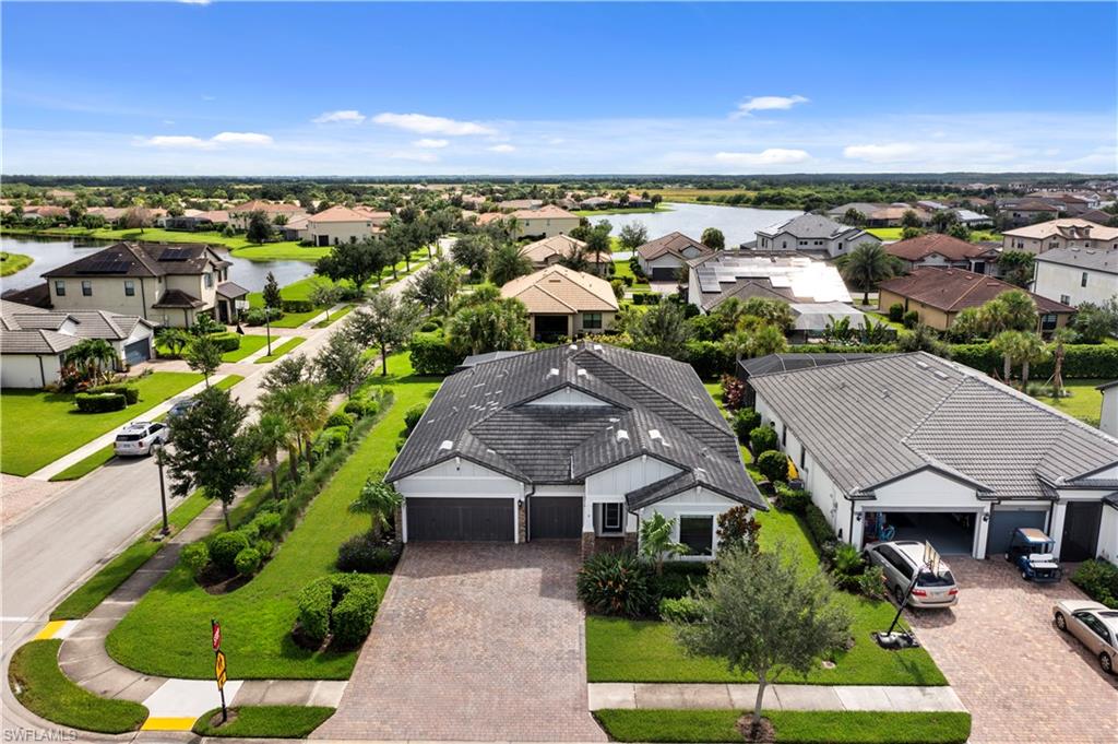 an aerial view of a house with a garden