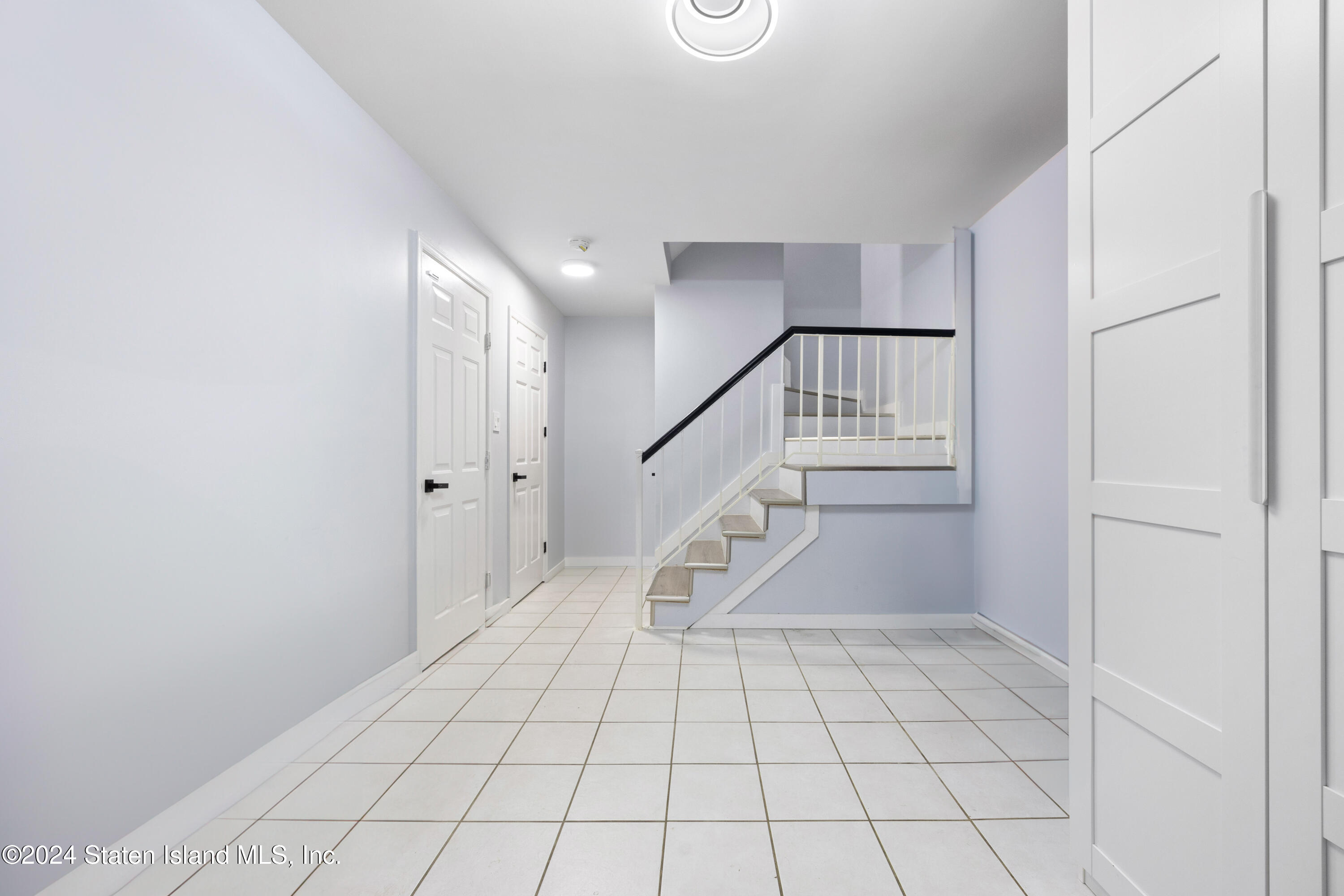 a view of an entryway with white walls