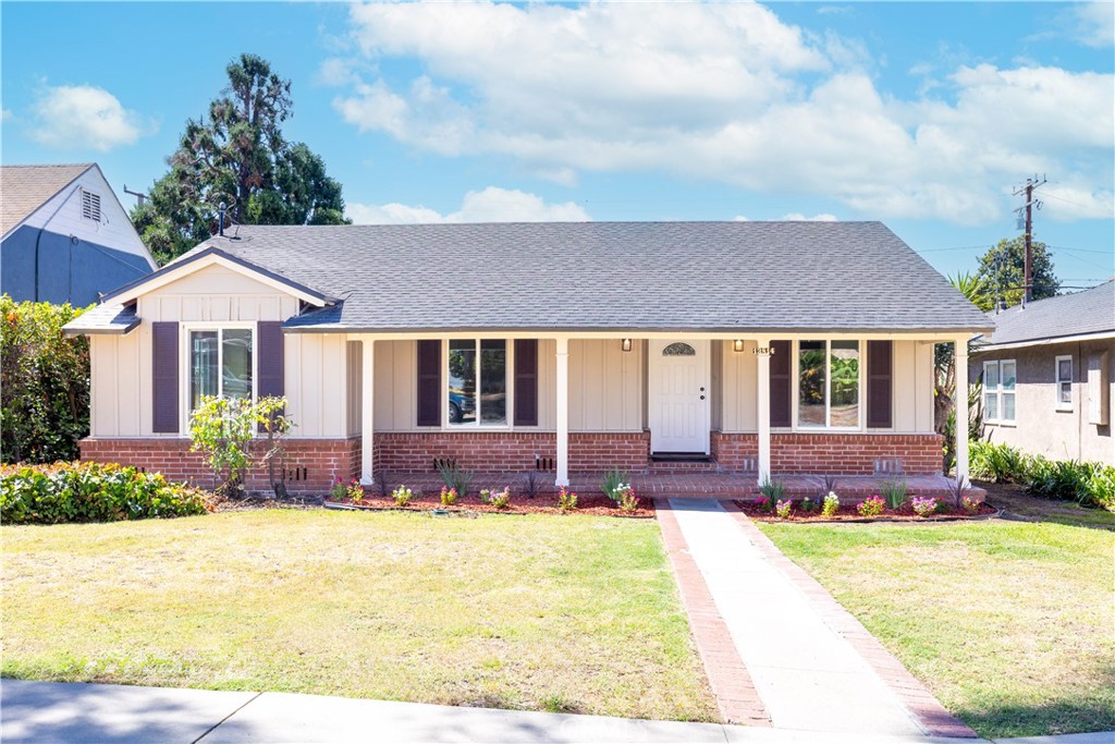 a front view of a house with a patio