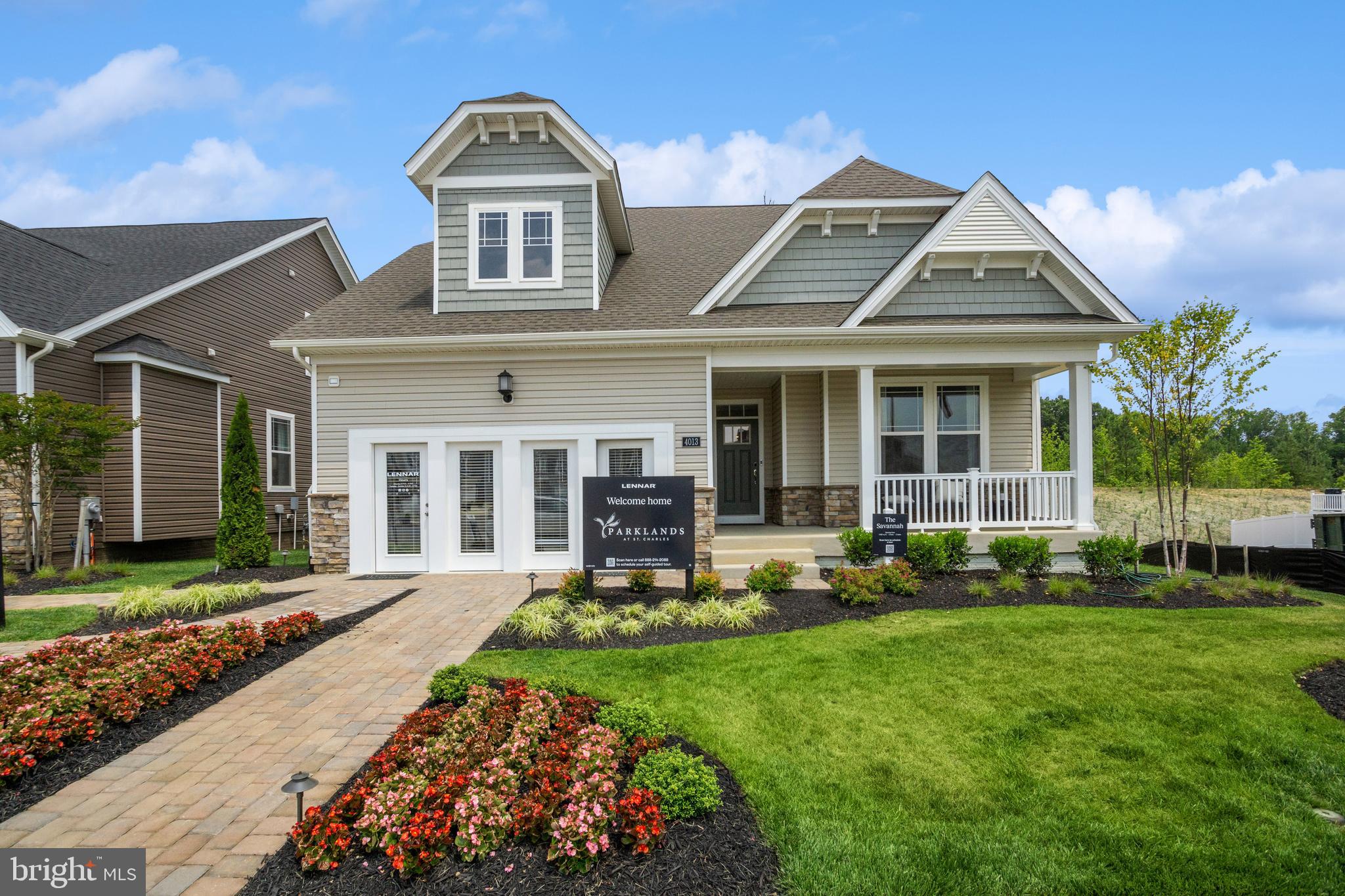 front view of a house with a yard