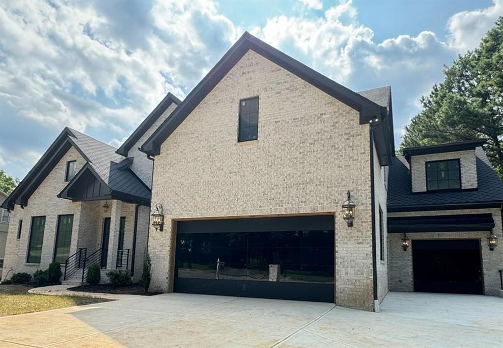 a front view of a house with a garage