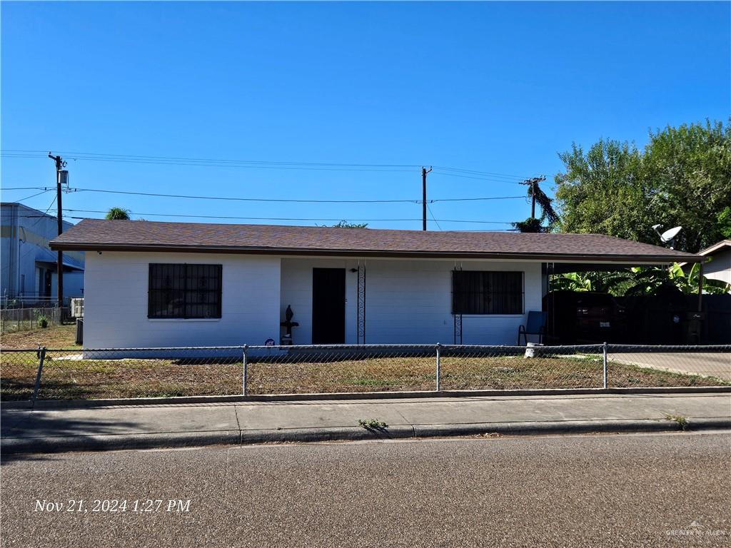 a front view of a house with a garage