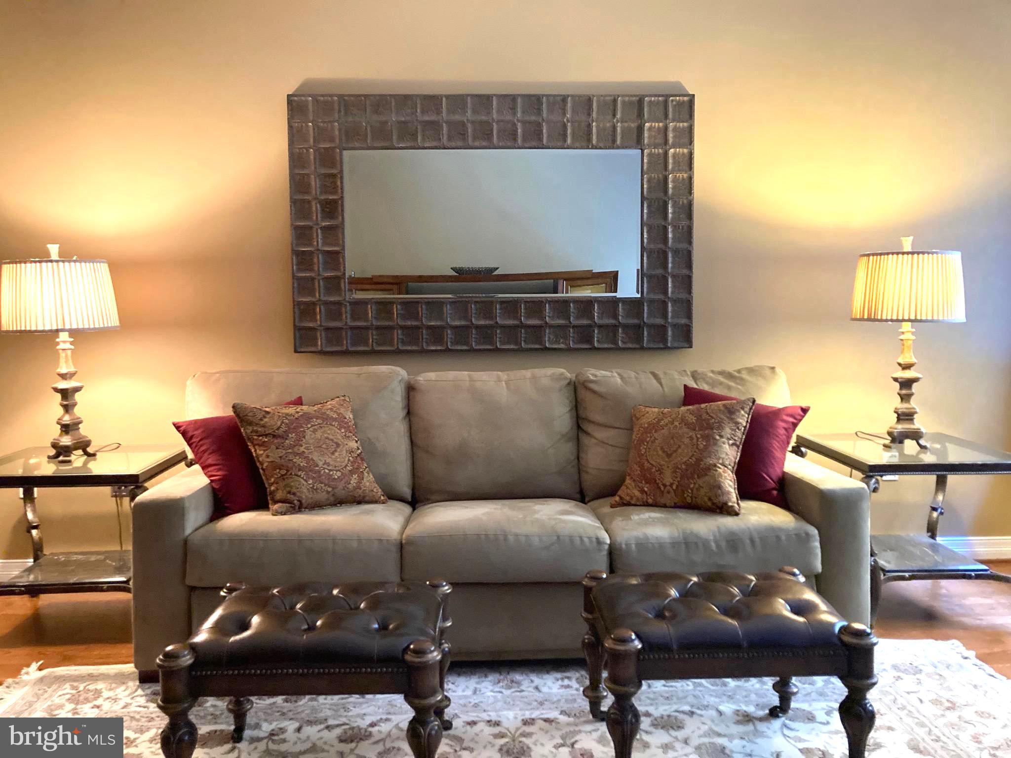 a living room with a couch and a coffee table