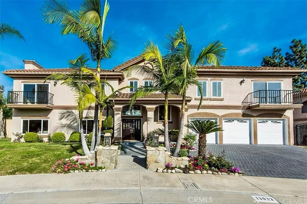 front view of a house with a street