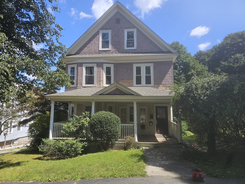 front view of a house and a yard