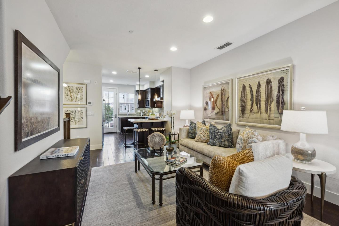 a living room with fireplace furniture and a flat screen tv