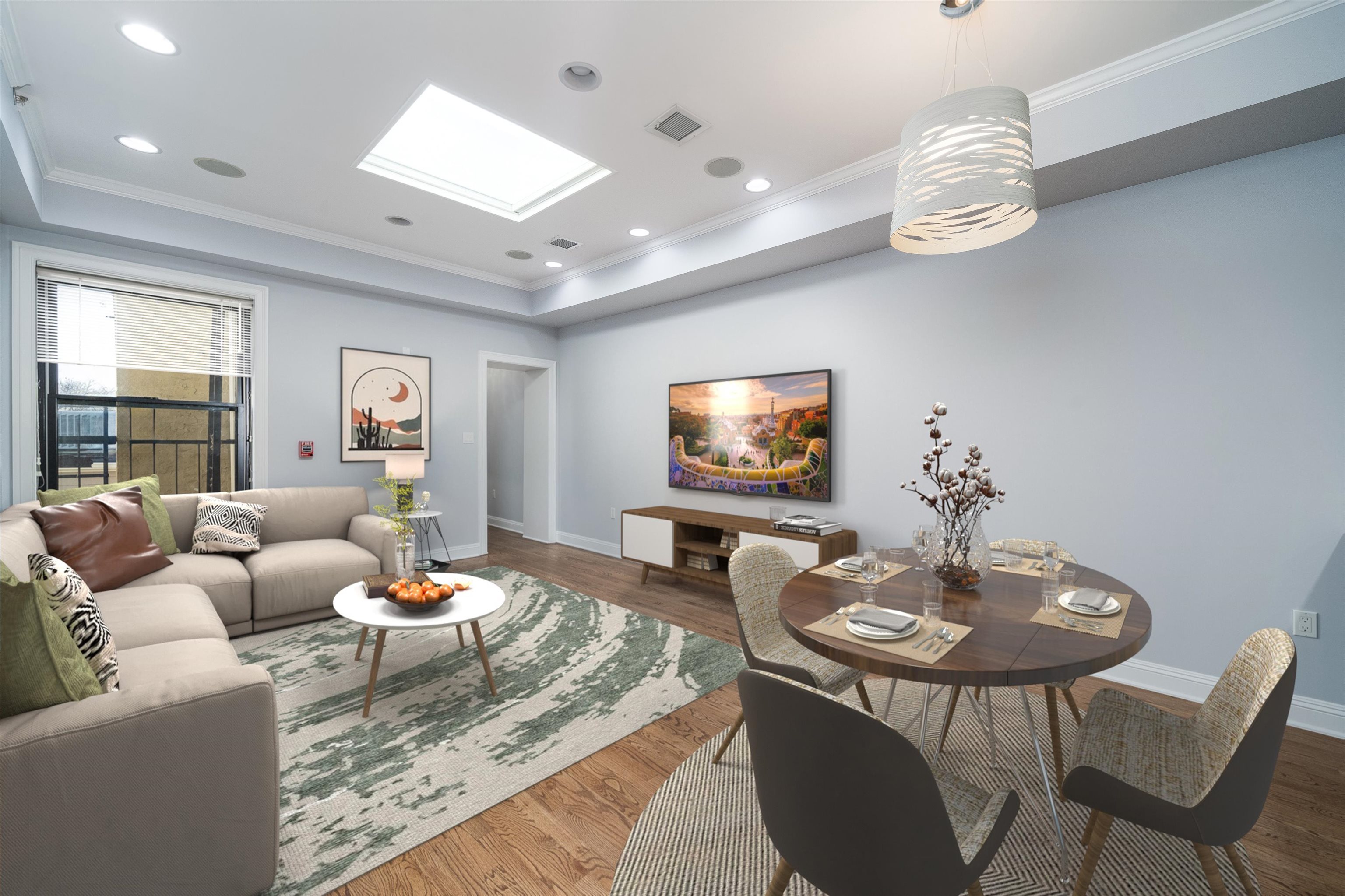 a living room with furniture and a flat screen tv