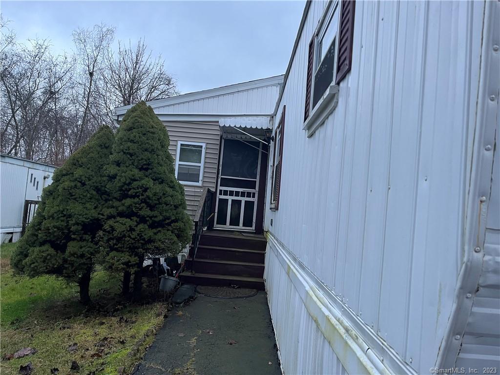 a view of balcony and yard