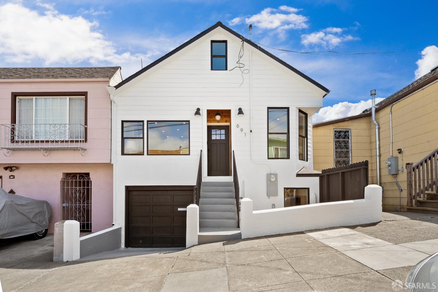 a front view of a house with entryway