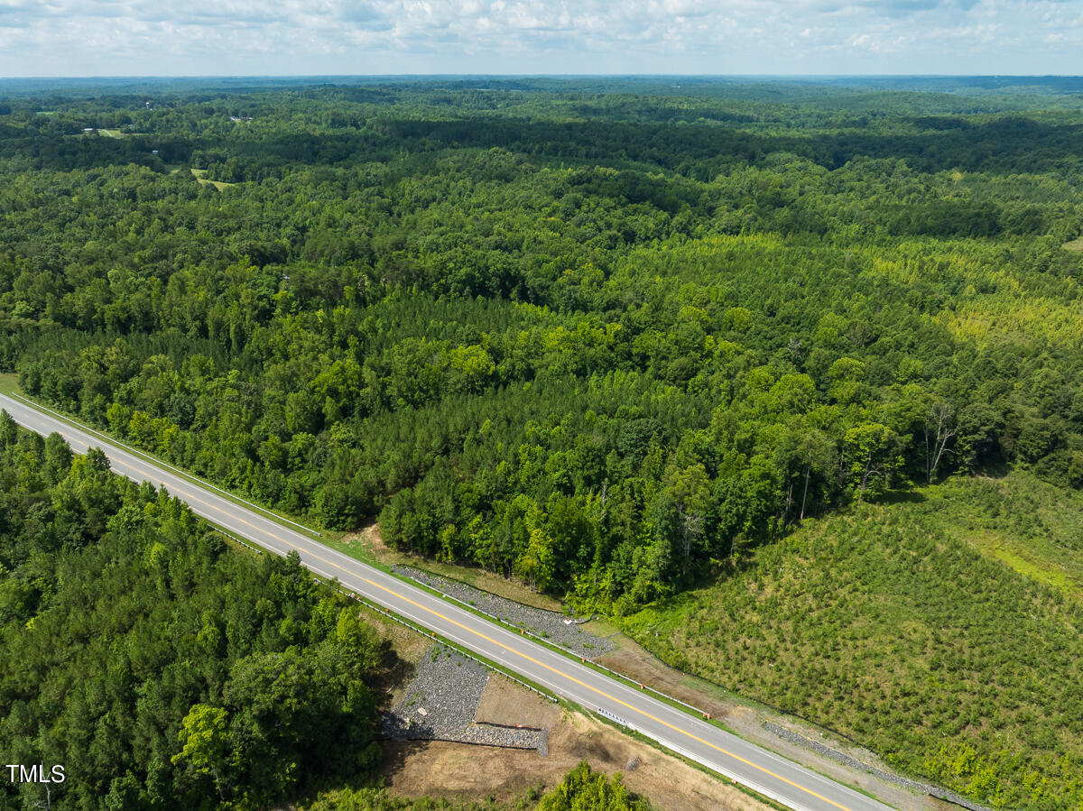 a view of a forest from a balcony