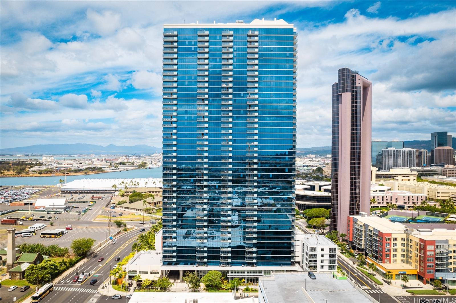 a view of a city with tall buildings