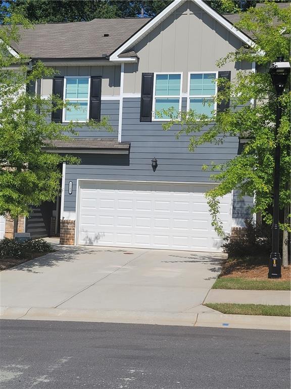 front view of a house and a yard