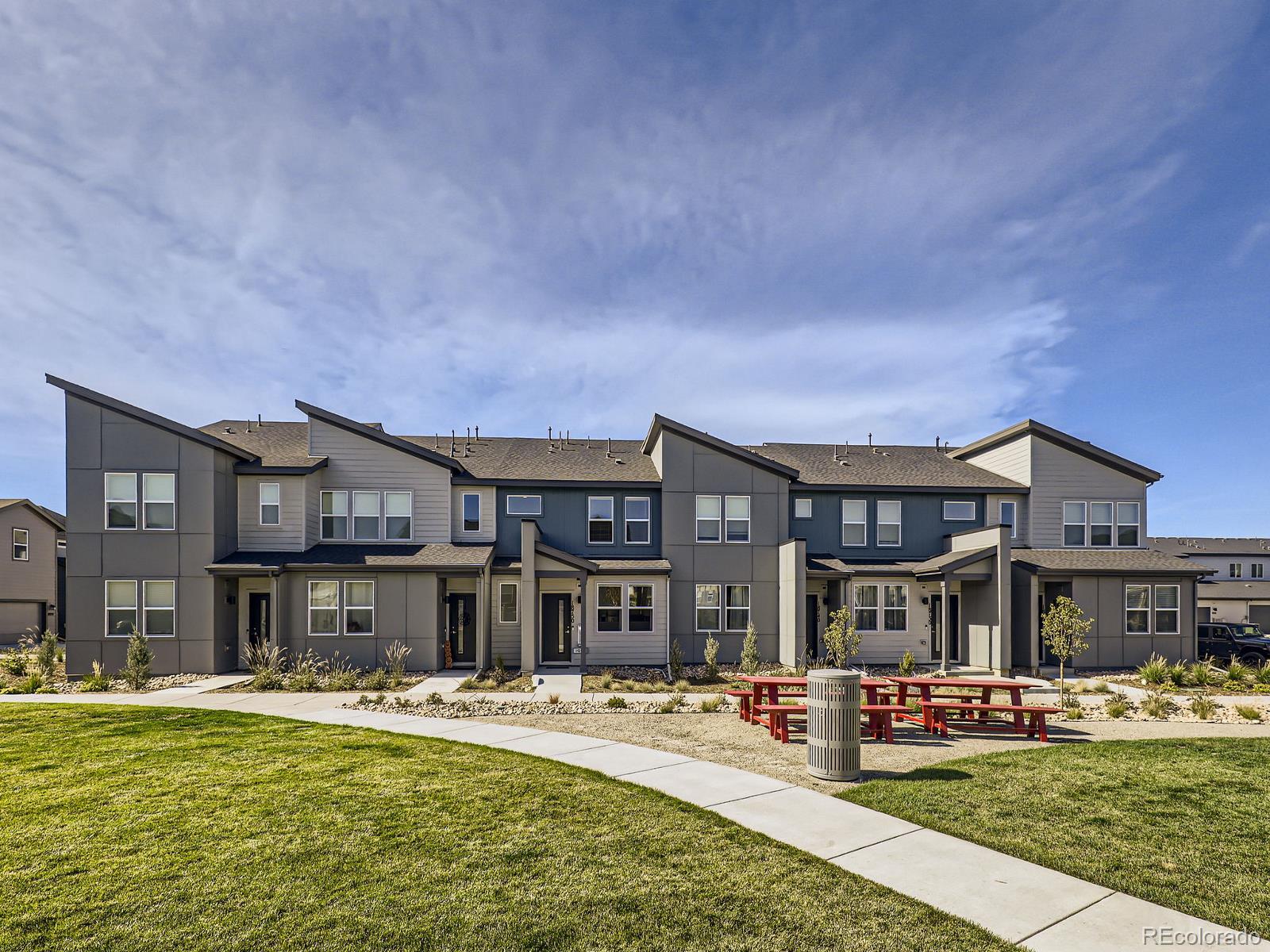 a front view of building with outdoor seating