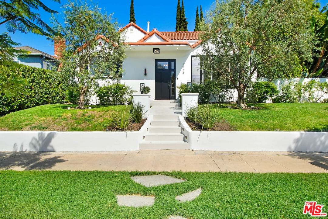 front view of house with a yard