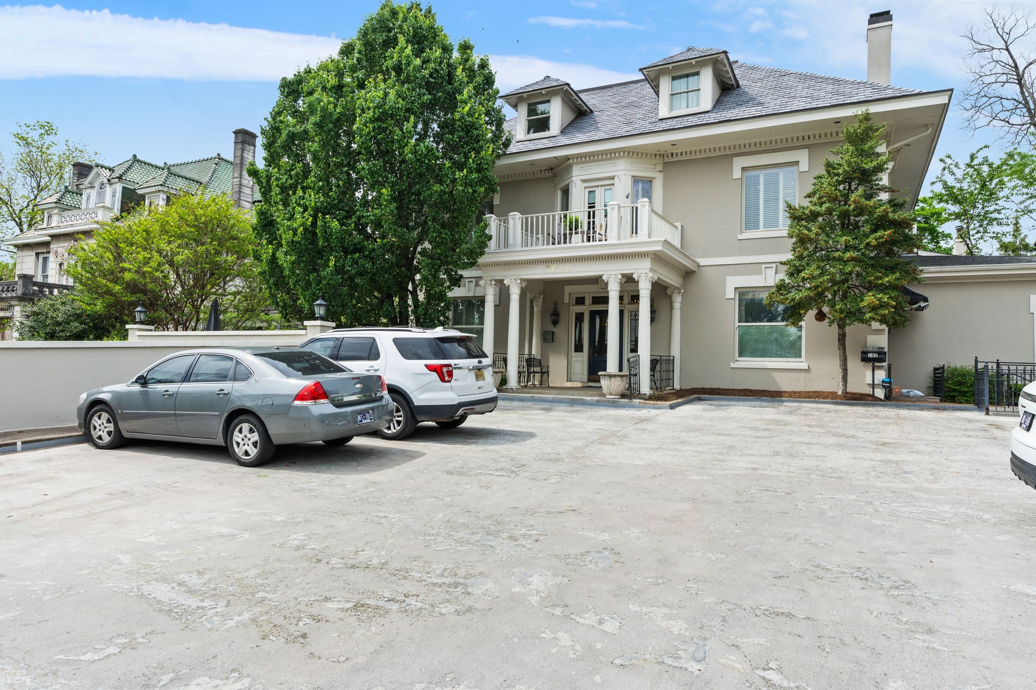 a view of car parked in front of house