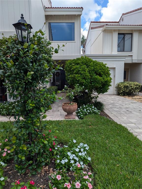 a house view with a garden space