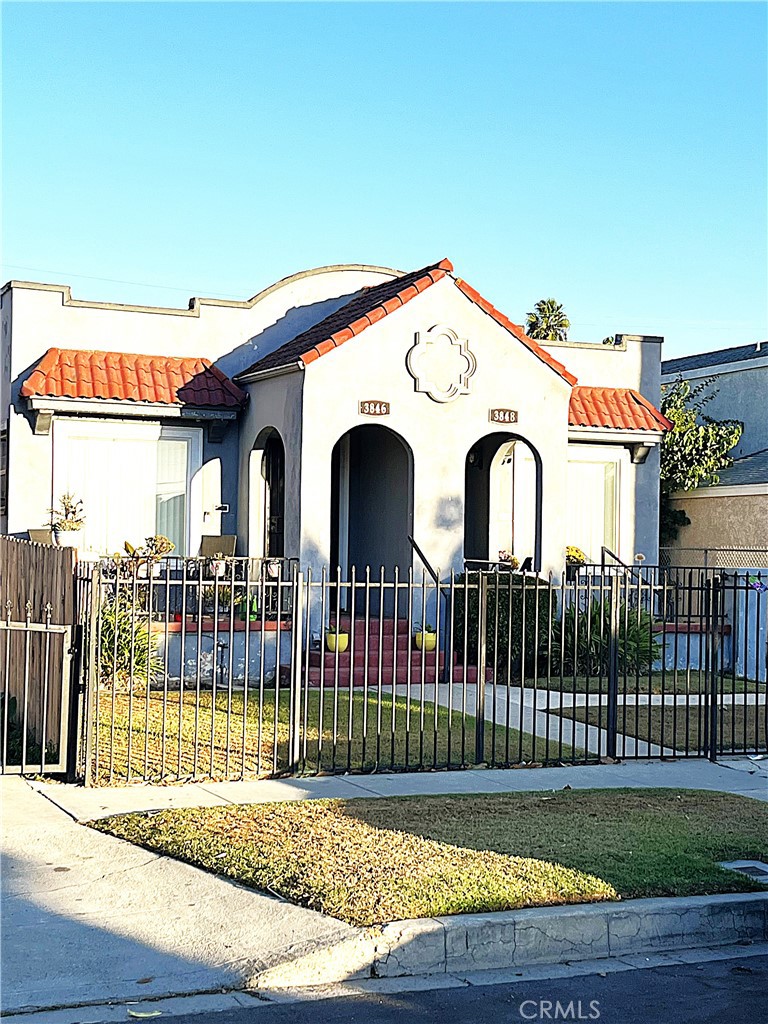 a view of a white house with a outdoor view