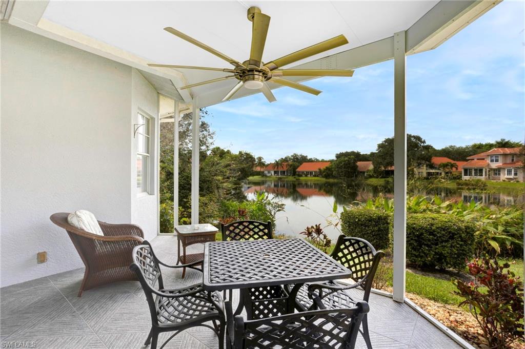 a view of a patio with a table chairs and a table