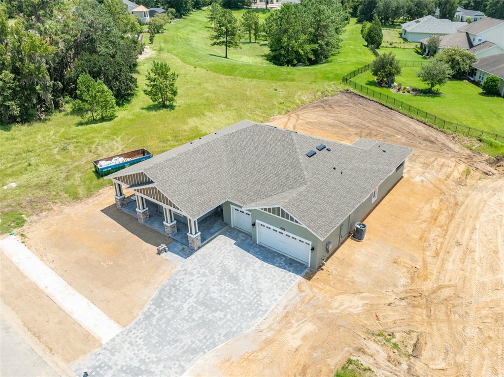 an aerial view of a house having yard