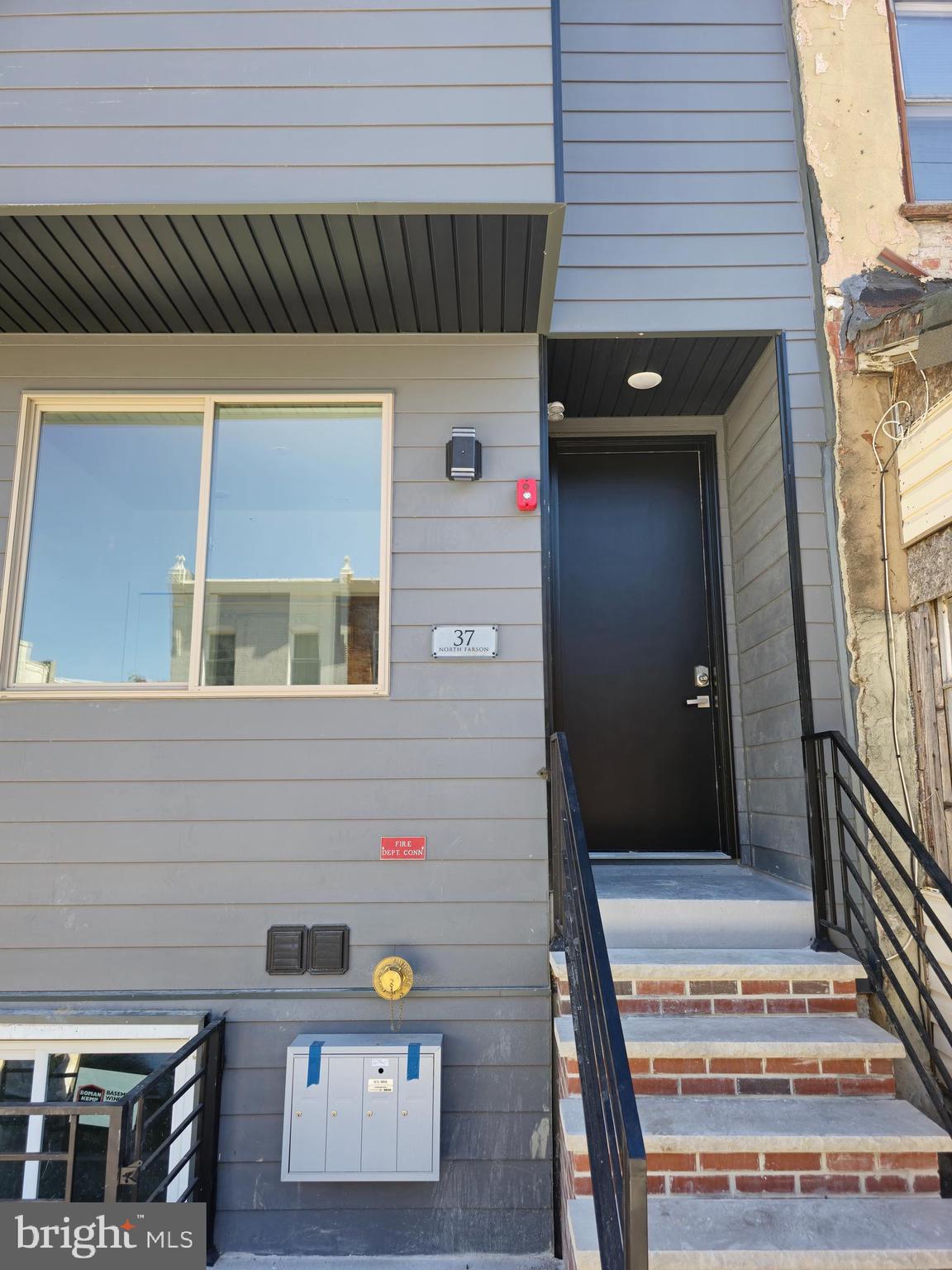 a front view of a house with a door