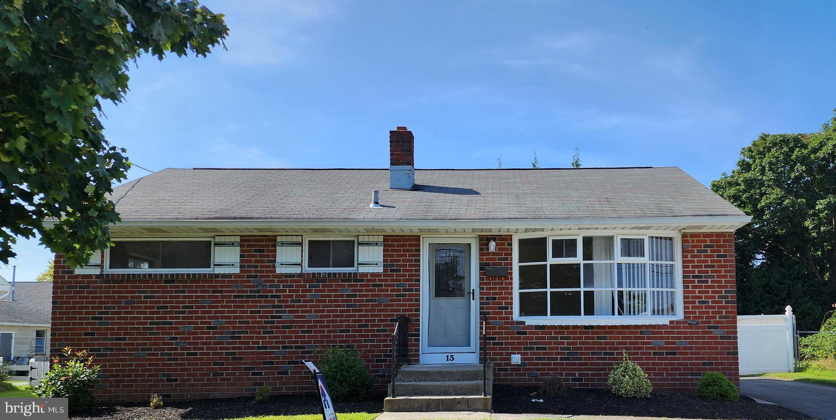 a front view of a house with a garage