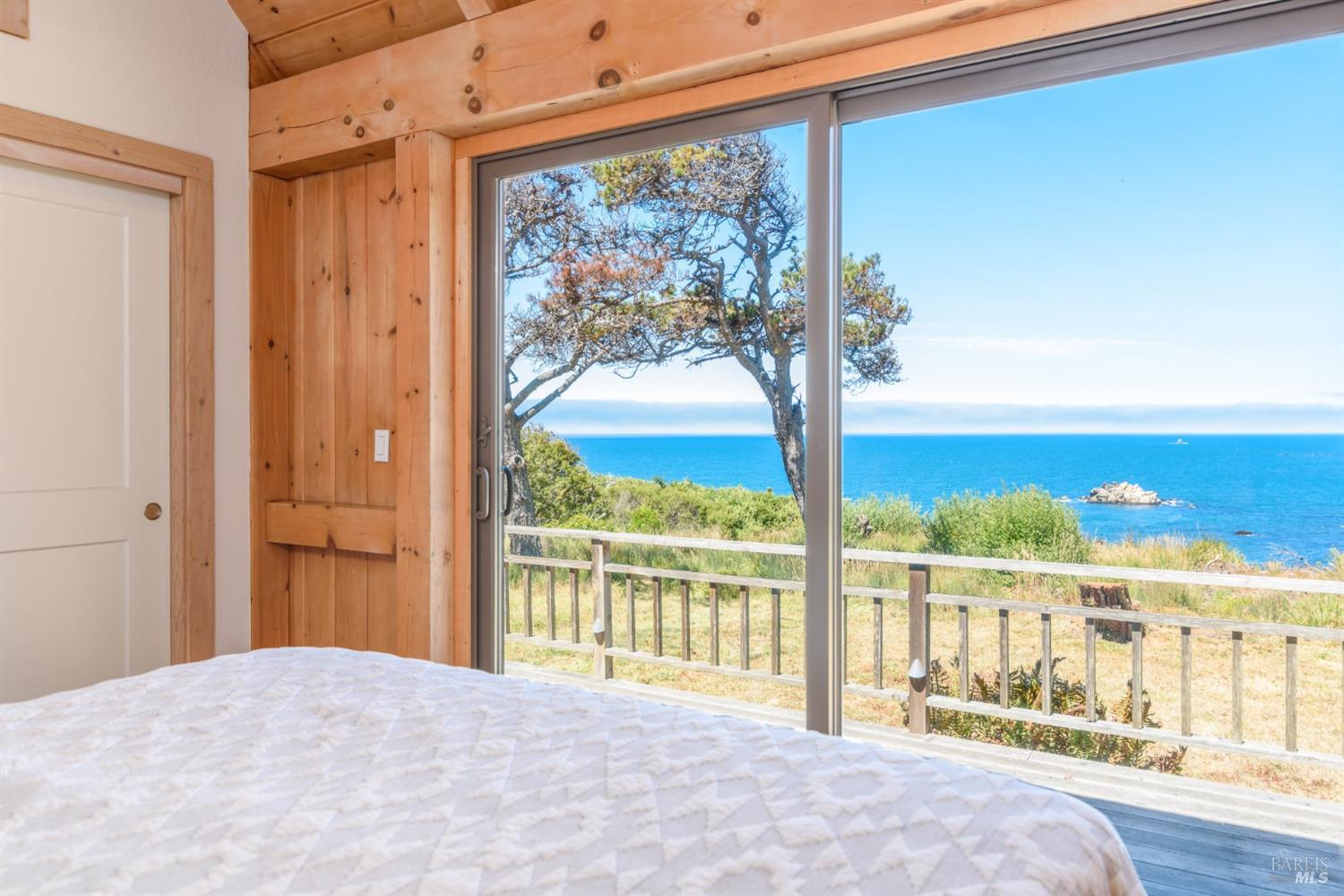 a view of a balcony with an outdoor space