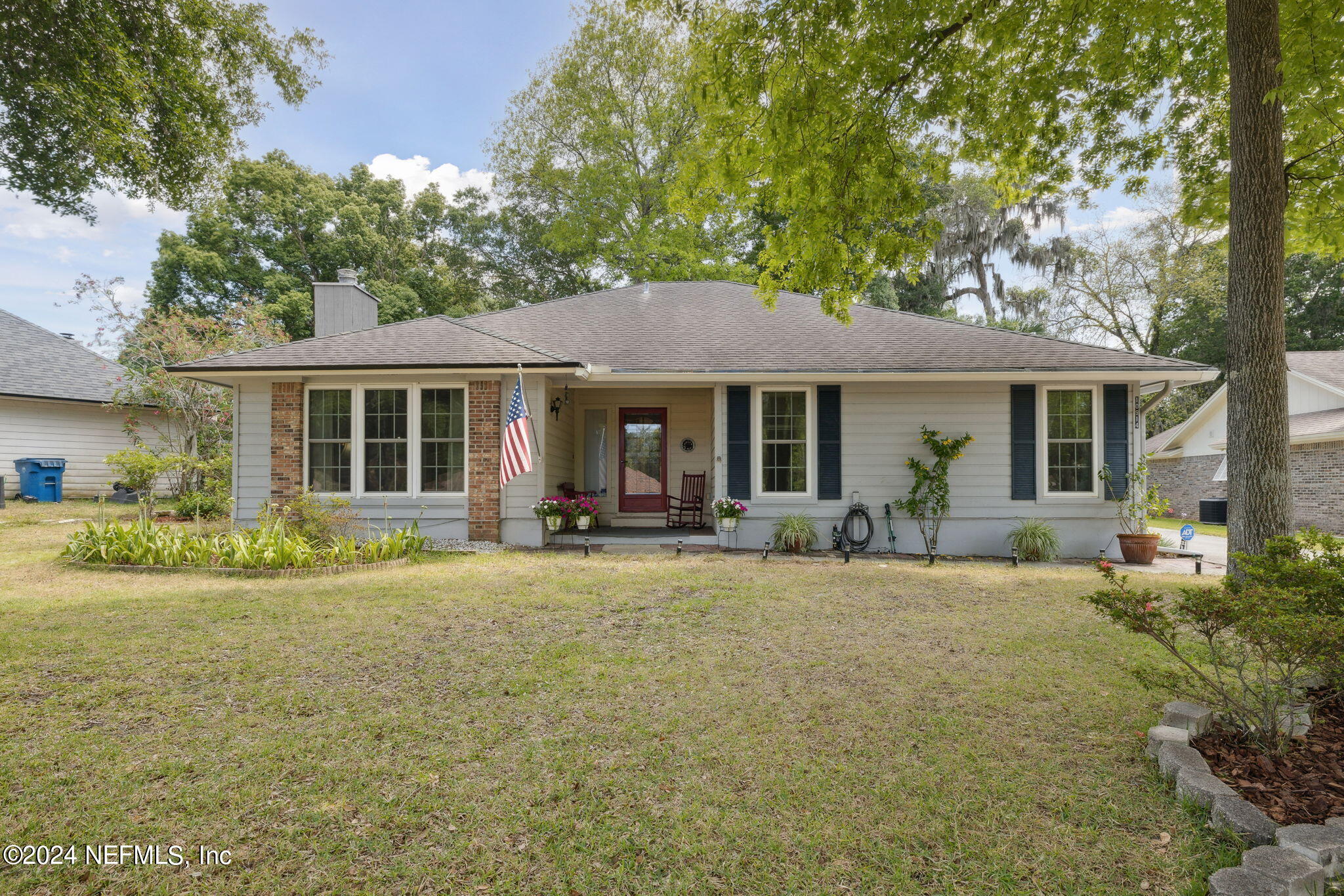 a front view of a house with a patio