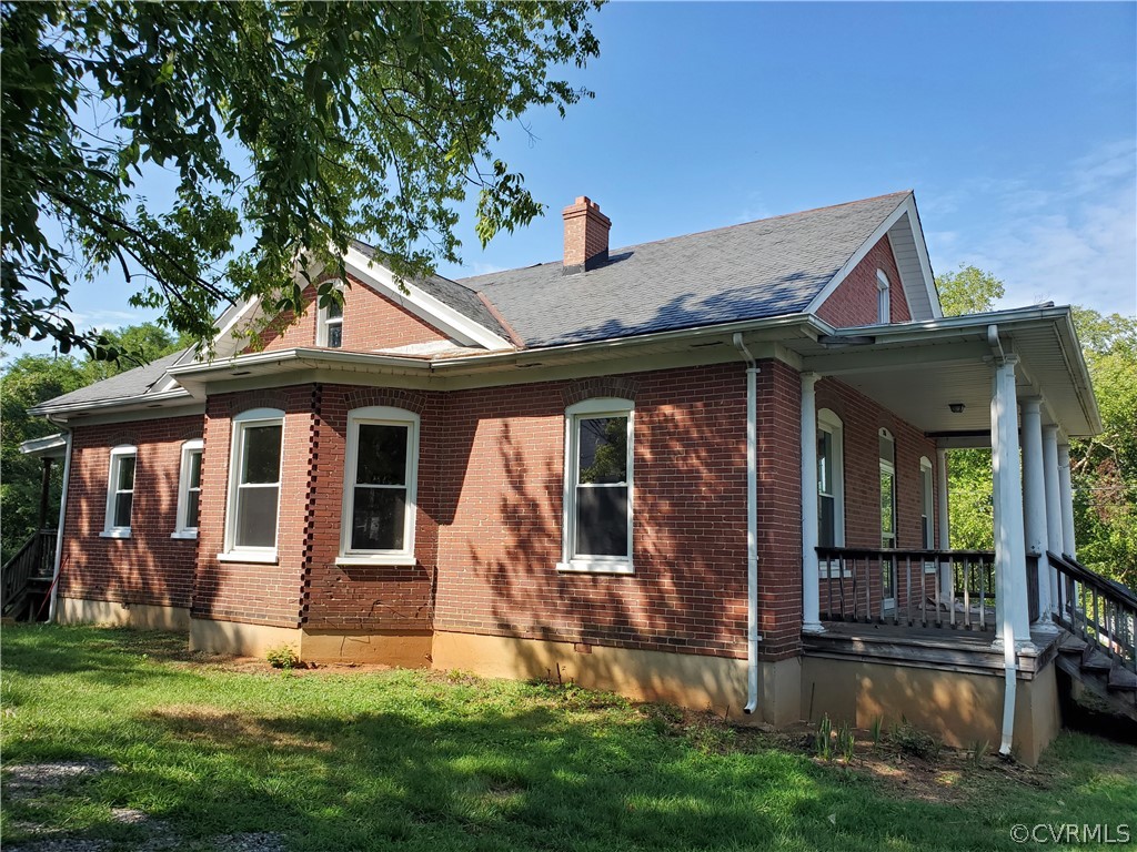 front view of a house with a yard