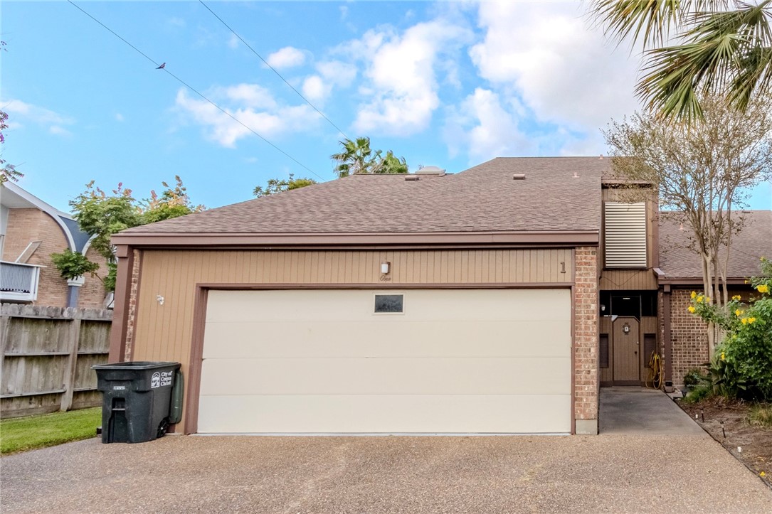 a view of a house with a garage