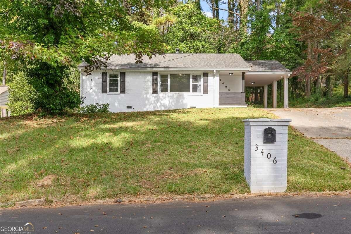 front view of a house with a yard