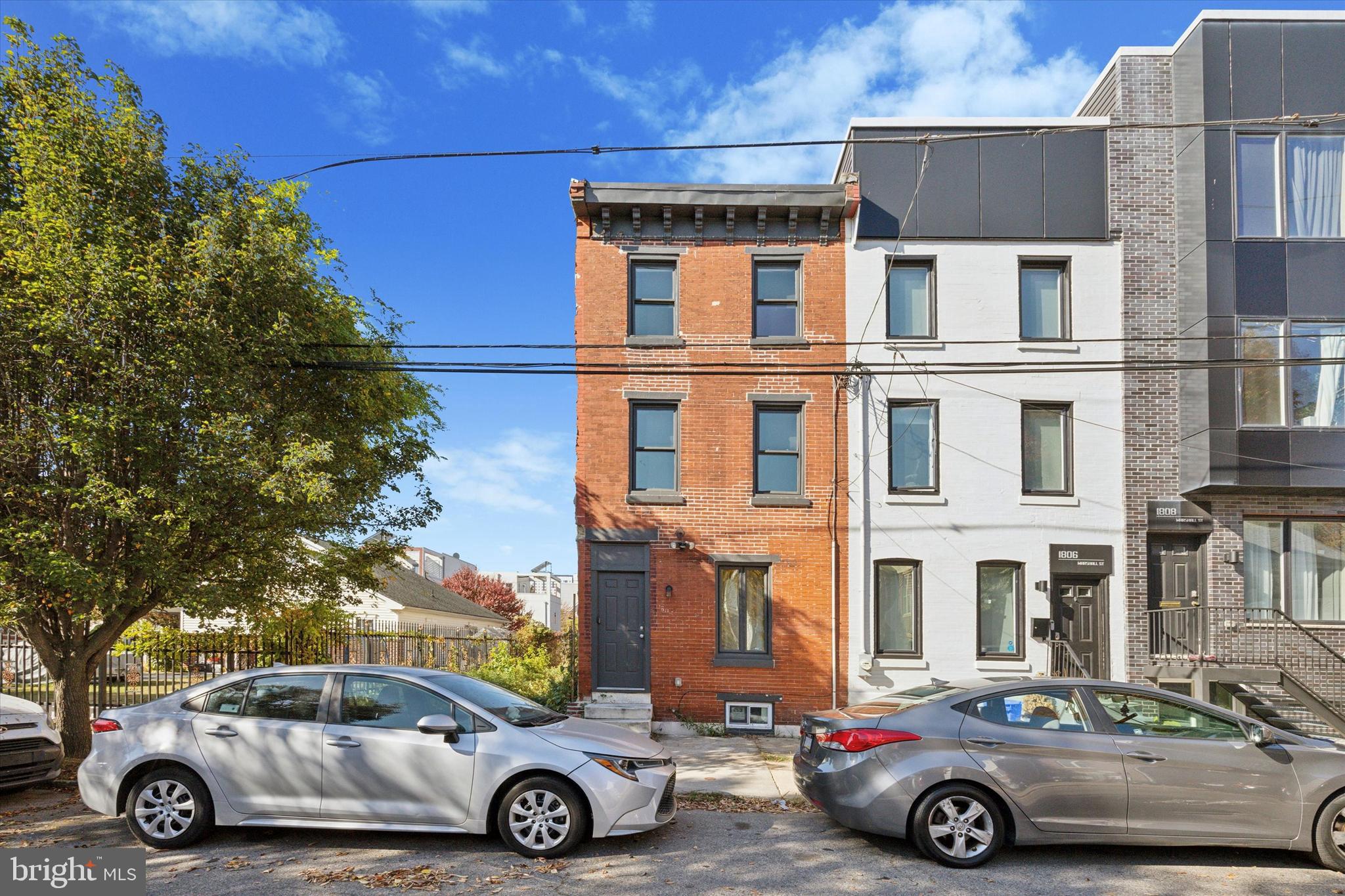 a car parked in front of a house