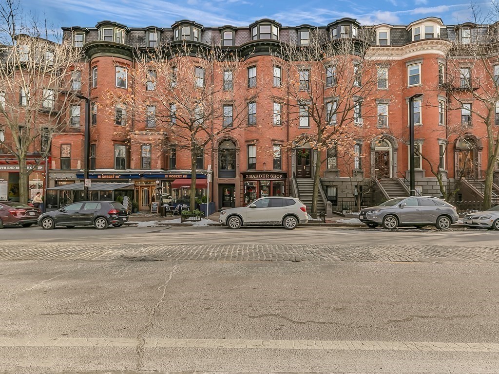 a view of a building with a street