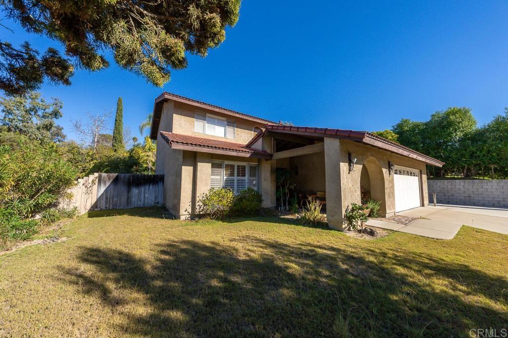 a view of a house with a patio