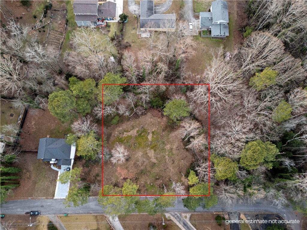 an aerial view of residential house with outdoor space