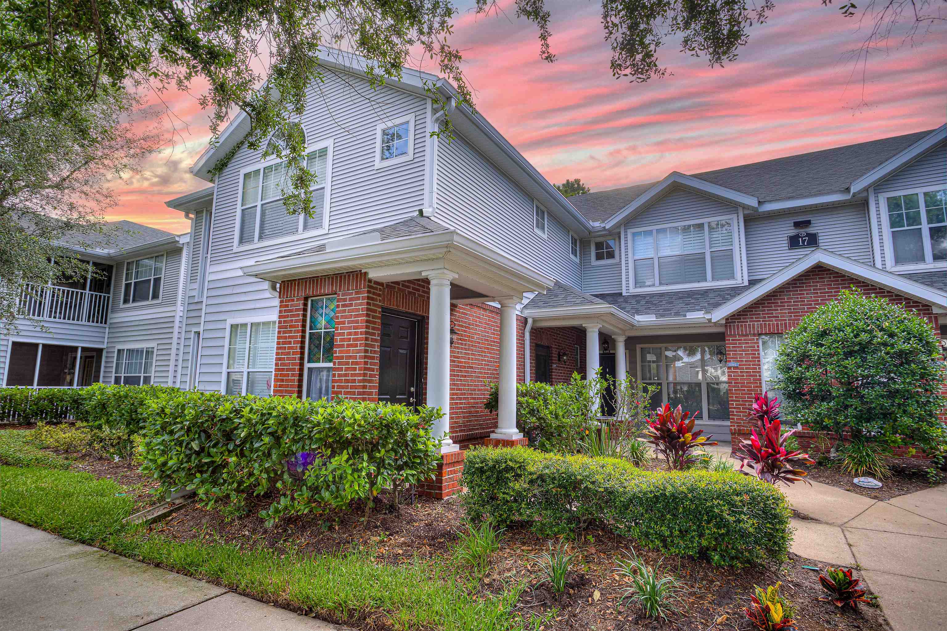 a front view of a house with yard